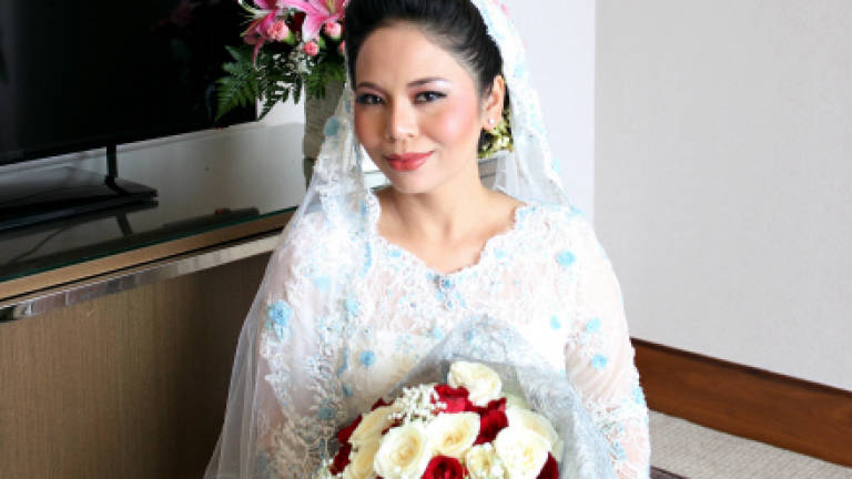 Khir Toyo takes civil servant as second wife