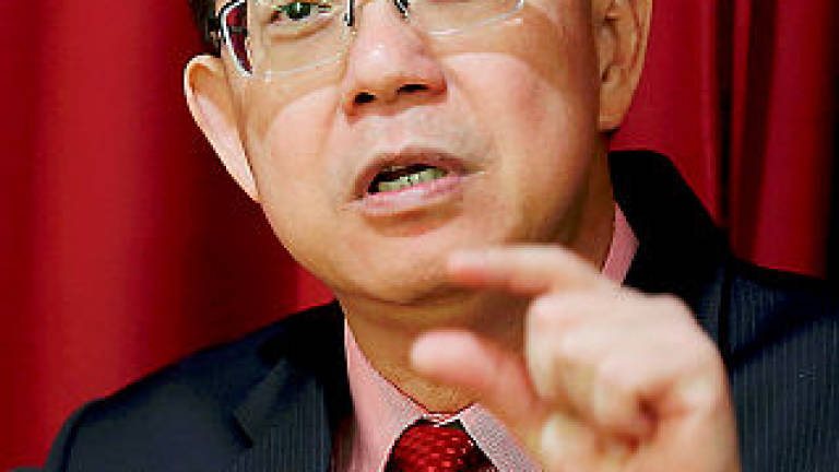 Guan Eng will consider debating Liow