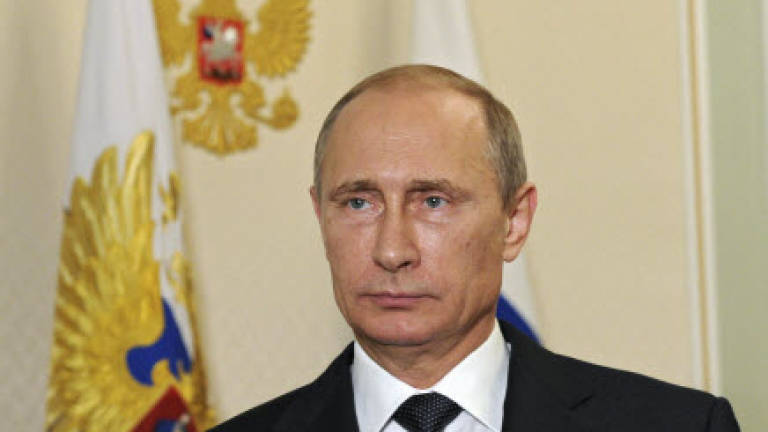 Putin demands access for experts at Ukraine crash site
