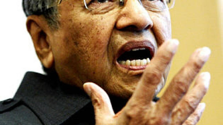 If you have suspicions, call the organisers in, Tun M tells IGP