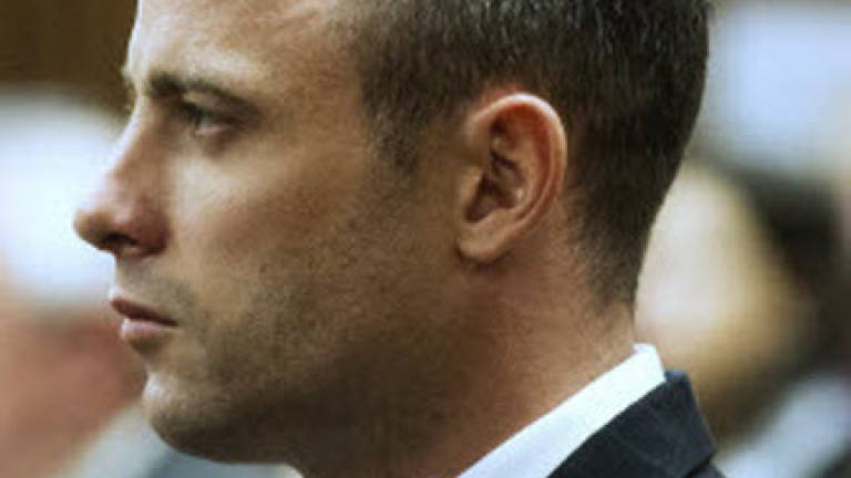 Pistorius returns to court after mental evaluation