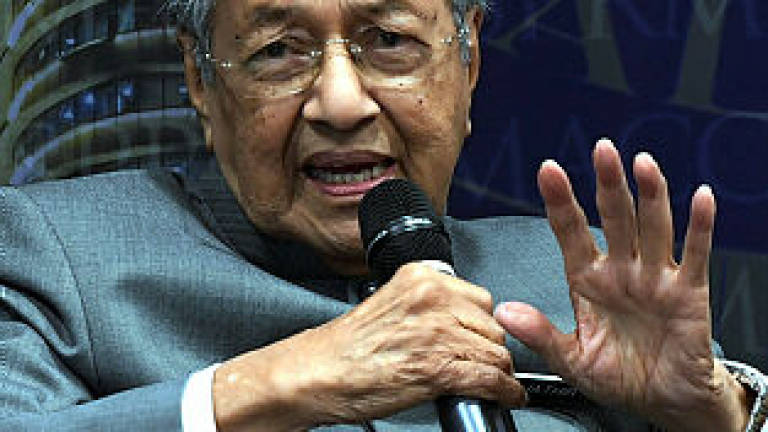 Dr M's visit to China could ramp up palm oil exports