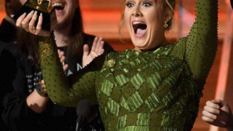 Adele wins top Album and Record of the Year Grammys