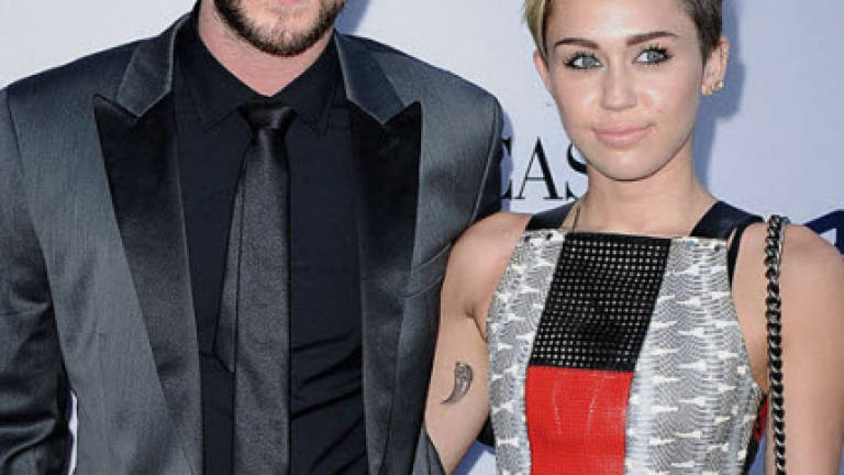 Miley Cyrus and Liam Hemsworth are just friends