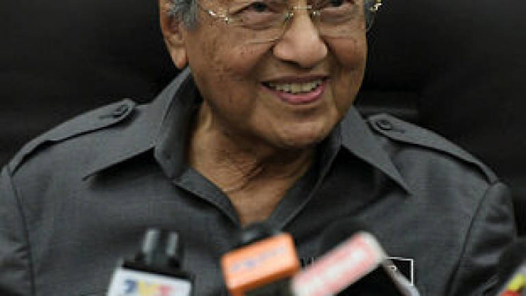 Mahathir says Khazanah not govt, free to be involved in third national car project