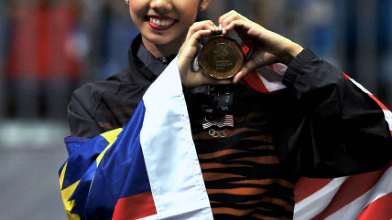 Malaysian gymnast Sie Yan clinches individual all-around gold
