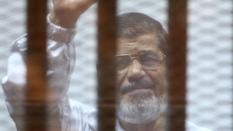 Egypt confirms death sentences against 22 Morsi backers