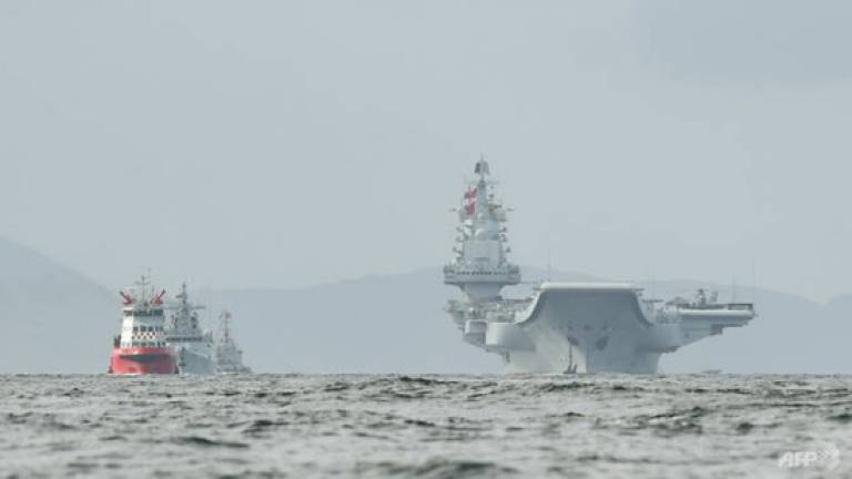 Chinese aircraft carrier Liaoning arrives in Hong Kong