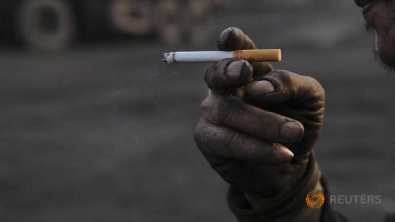 Smoking costs US$1 trillion, soon to kill 8 million a year