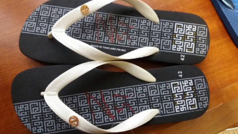 Jaipk seizes slipper with Quranic verses