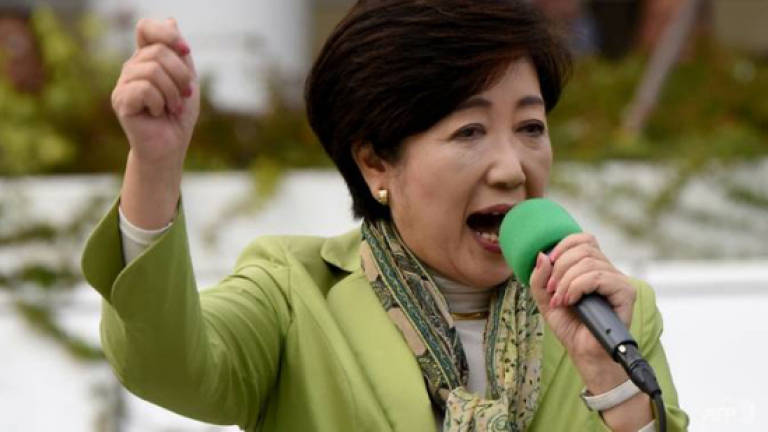Japan's Koike: Media-savvy operator with stomach for a fight