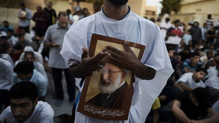 Bahrain jails, revokes citizenship of 8 Shiites