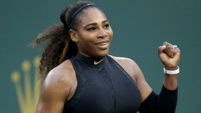 Venus Williams knocks out Serena, Wozniacki marches on