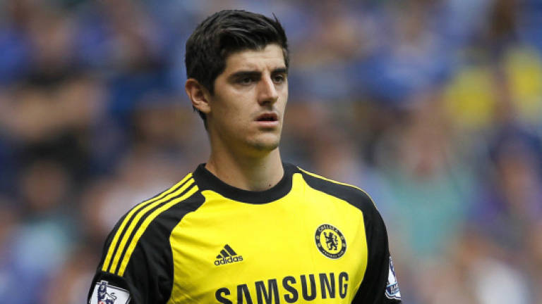 Conte vows to keep Courtois