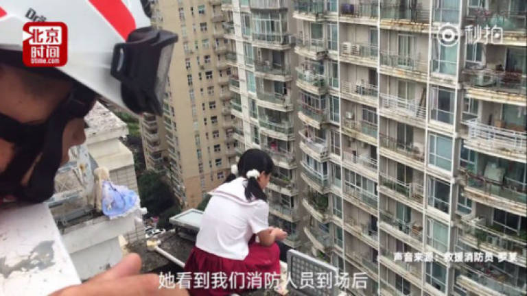 Principal stops student from jumping off 17-storey building