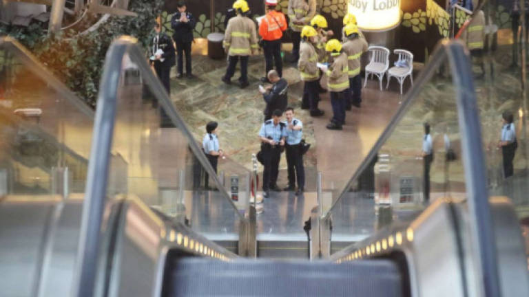(Video) 18 injured as mall escalator reverses at high speed