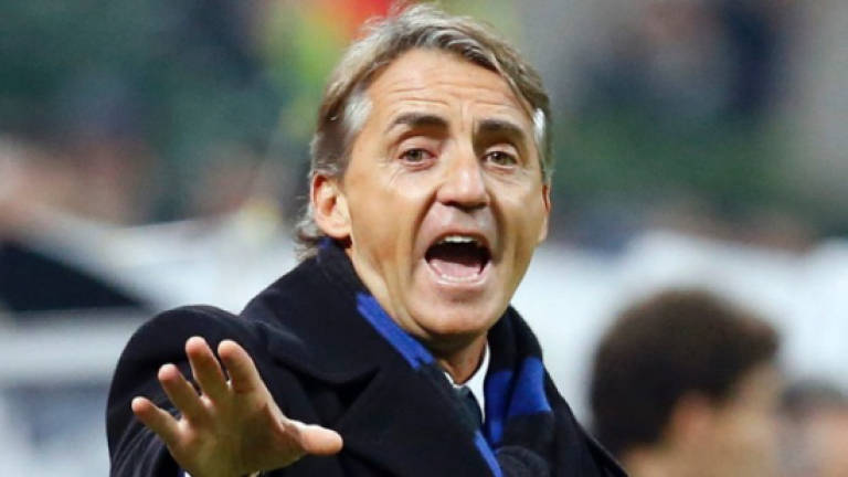 Mancini slams 'envious' Gullit