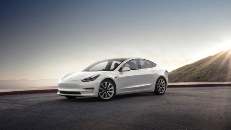 Tesla begins to deliver model for the masses (Video)