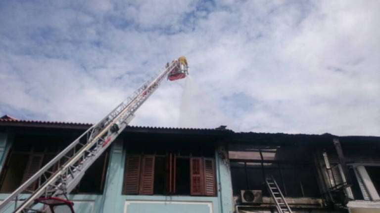 Two prewar shoplots severely damaged during fire in Lebuh Cintra