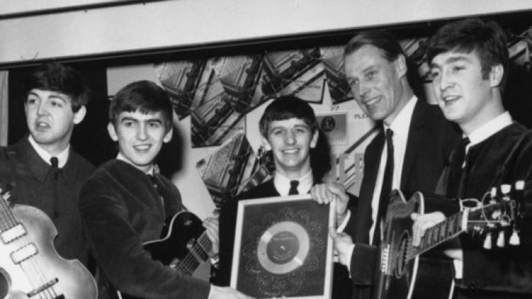 Score for Beatles hit 'Eleanor Rigby' goes for auction