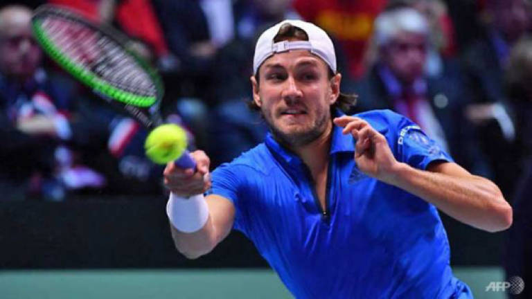 Pouille powers France to Davis Cup glory