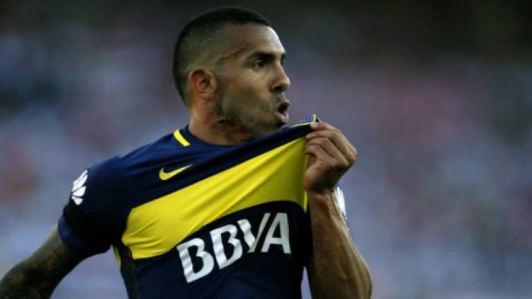 Tevez leaves China, signs for Boca Juniors for 3rd time