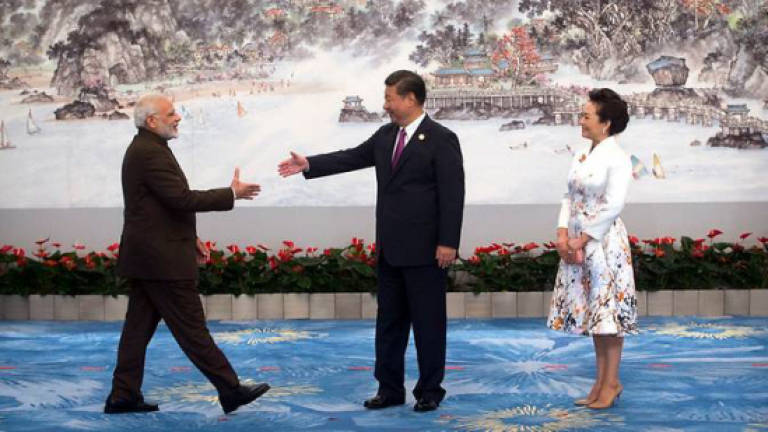 Xi tells Modi 'healthy, stable' China-India ties needed