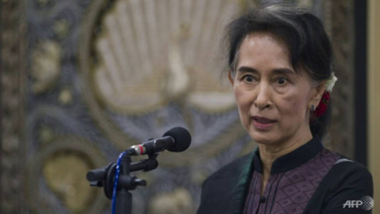 Myanmar official charged for Suu Kyi slur