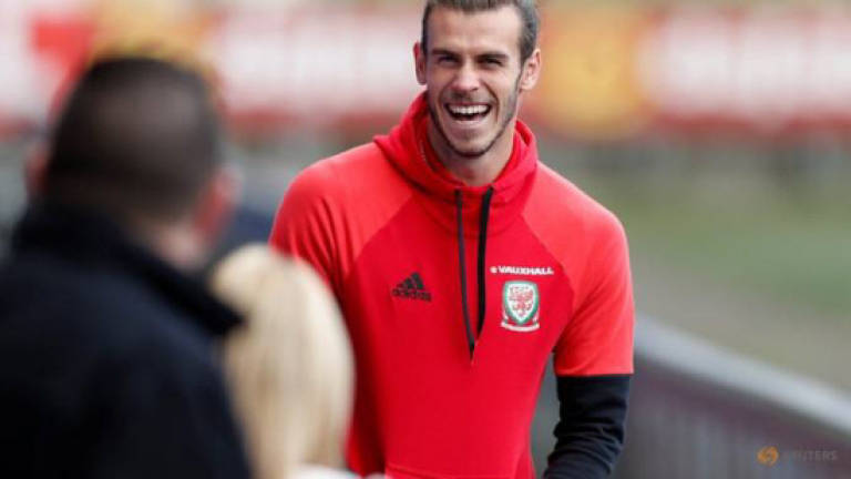 Bale returns as Real progress in Cup