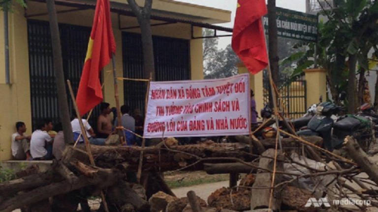 Vietnamese police 'held hostage' by residents in land dispute