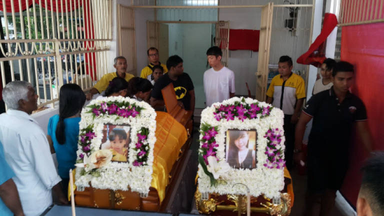 Husband bids farewell to drowned wife and son