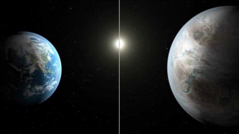 Nasa discovers Earth-like planet orbiting 'cousin' of Sun