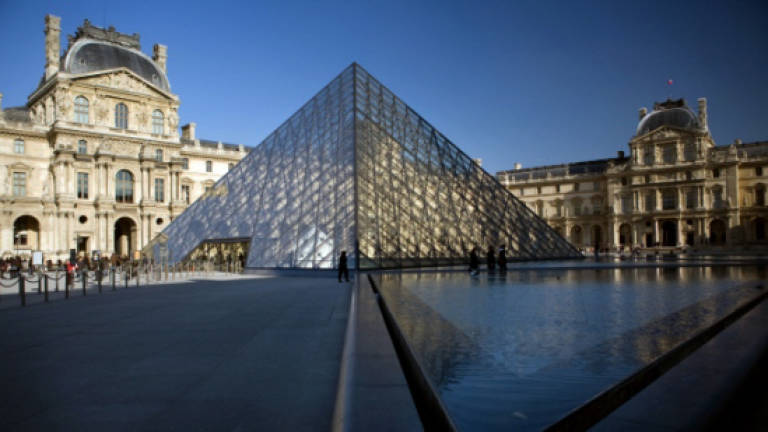 Artist to face trial for 'flashing' at Louvre