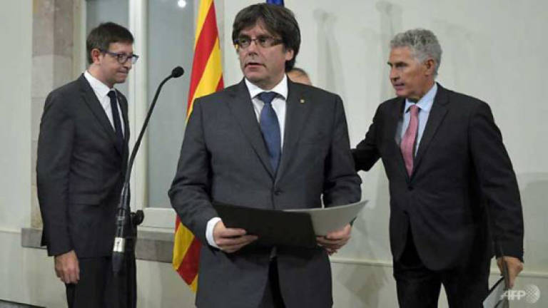 Catalan leader vows to see through independence bid