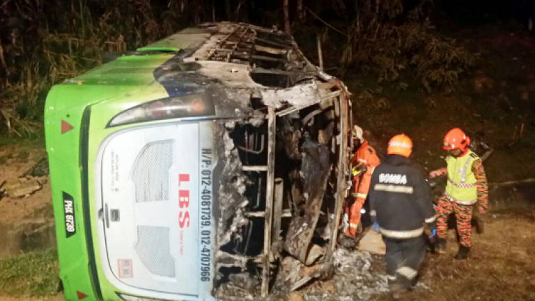 Eight dead, 21 hurt as bus bursts into flames after crash