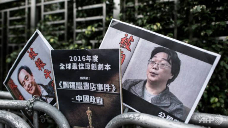 'Missing' bookseller returns to Hong Kong, seeks end to probe