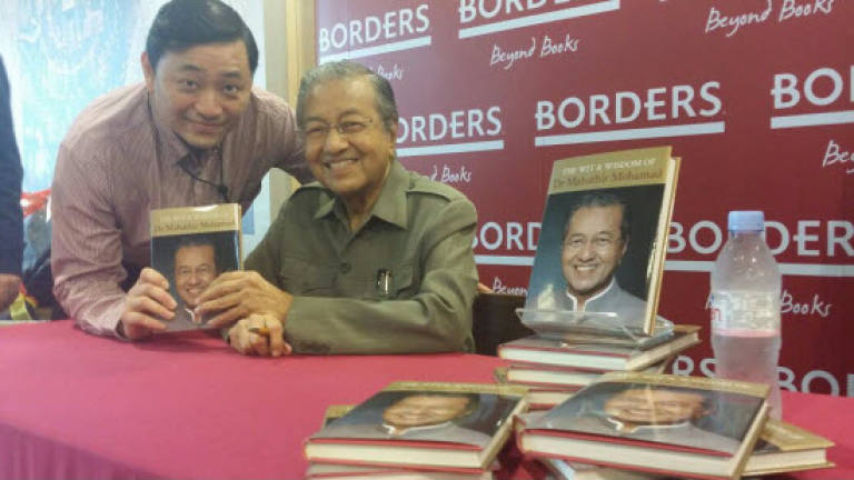 Tun M entertains the crowd with trademark wit at book launch