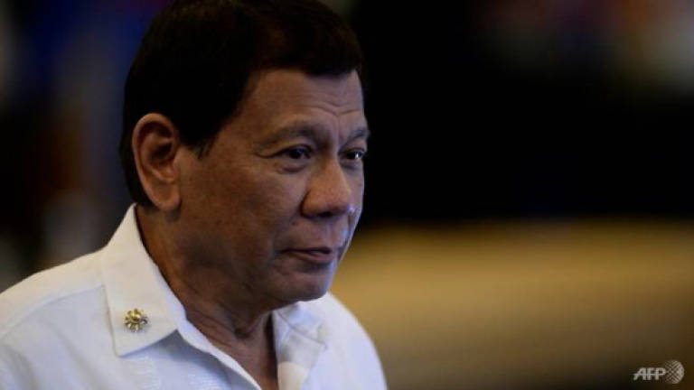 Philippines' Duterte sanctions corruption prober after bank records 'leak'