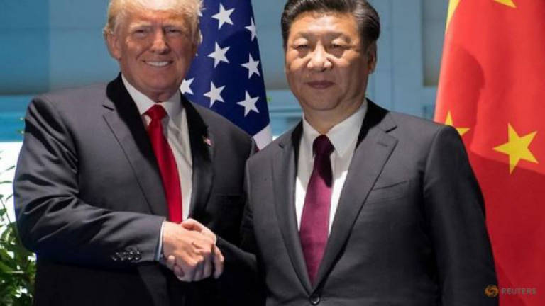 Xi tells Trump Beijing firm on N. Korea denuclearisation, talks