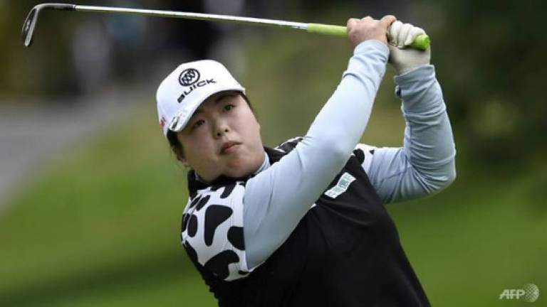 Feng holds on to rankings top spot