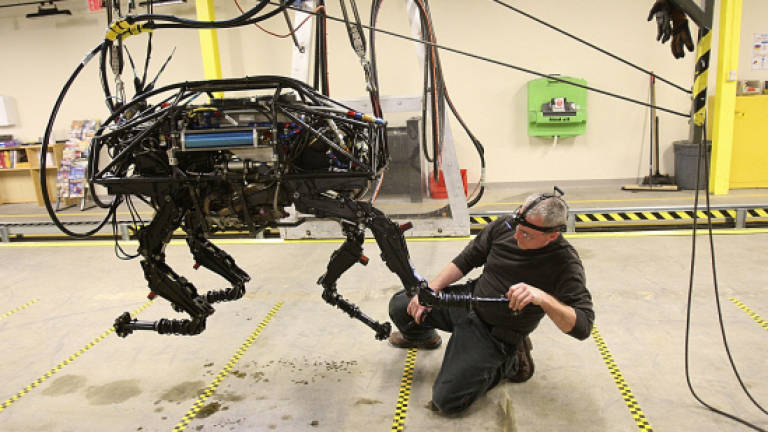 SoftBank to buy robot maker Boston Dynamics