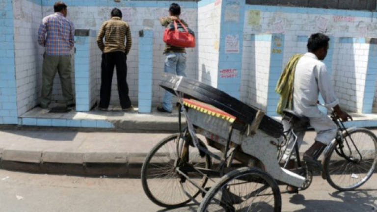 Indian minister mocked for urinating in public
