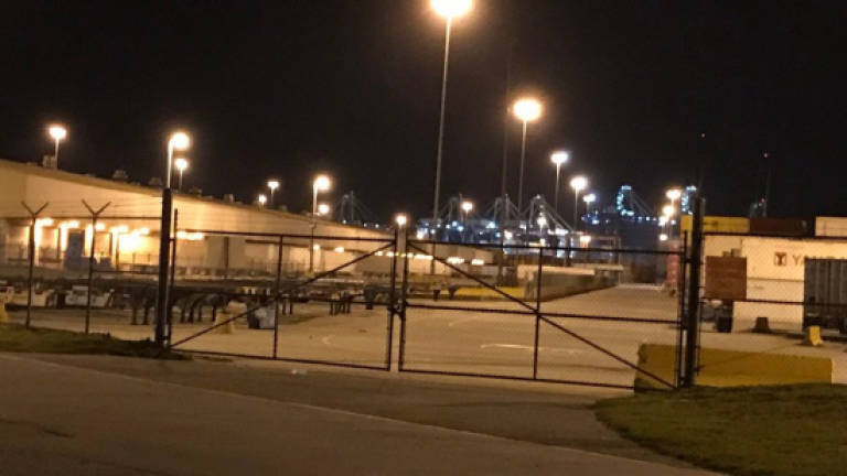 US port terminal evacuated after bomb threat