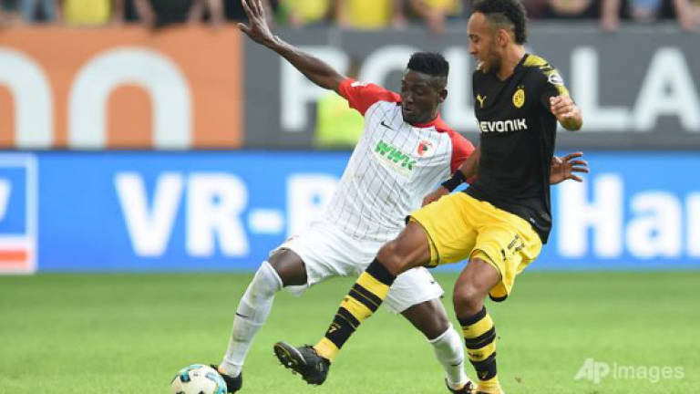 Dortmund go clear despite Aubameyang penalty howler