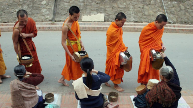 The Laos teens beating poverty as novice monks