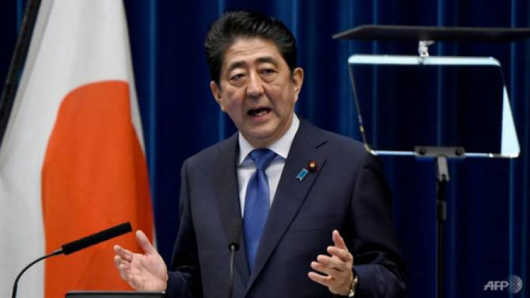 Abe sweeps to big win in Japan vote