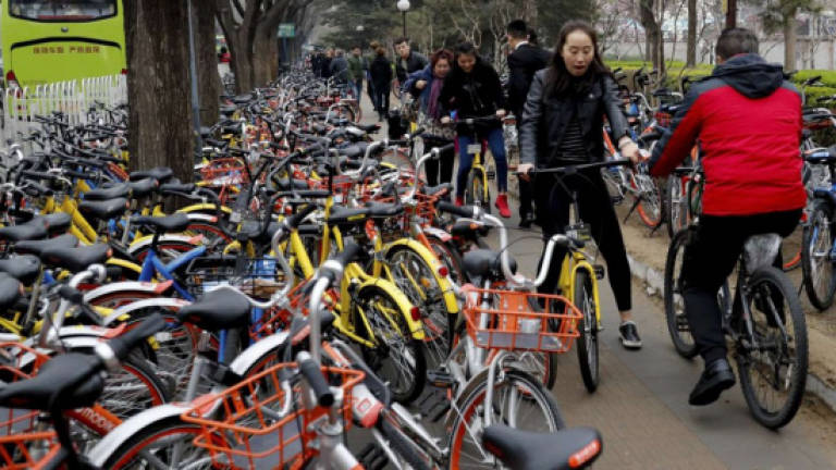 China issues bike-sharing guidelines as complaints rise