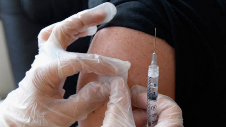 Private vaccines in China need more regulation: WHO