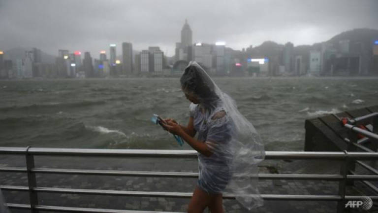Typhoon leaves 12 dead after lashing Macau, Hong Kong