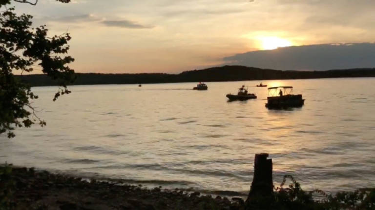 11 dead as boat capsizes and sinks in Missouri lake